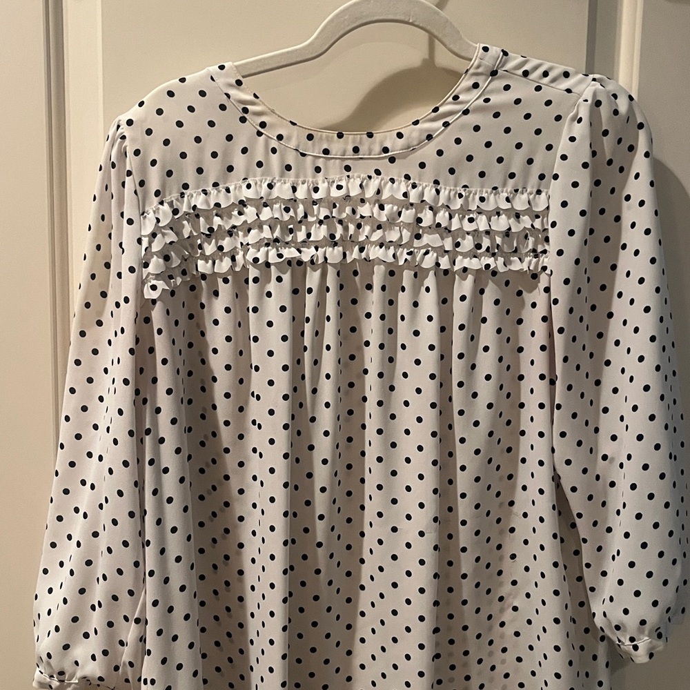 White and Black Smocked Blouse with Ruffled Bib Collar